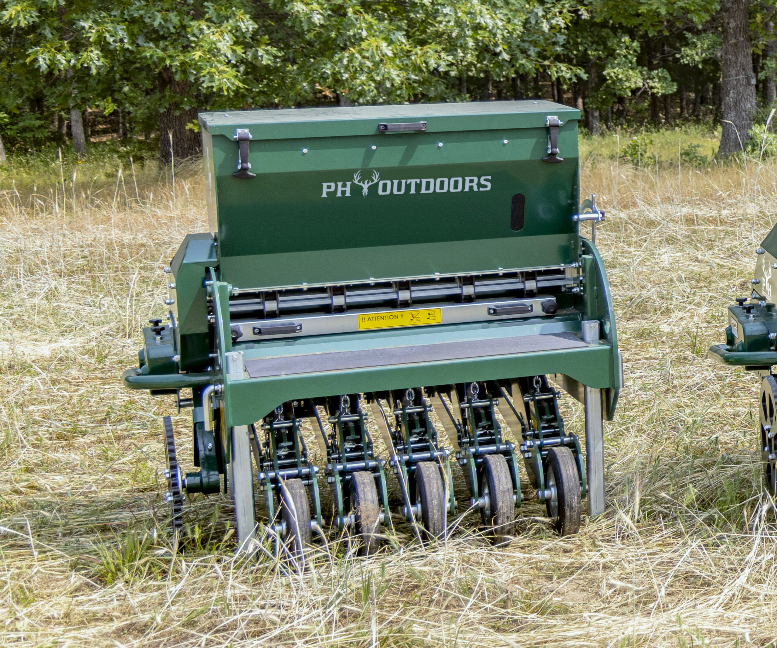New PH Outdoors Genesis 3 drill with 36" width, 5–7.5" adjustable row spacing, 3-point hitch, and a 4.8-bushel seed box.