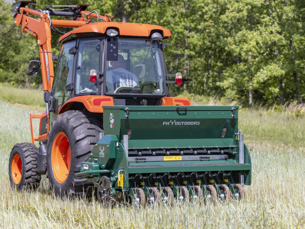 New PH Outdoors Genesis 5 drill with 60" width, 8 rows on 7.5" spacing, 3-point hitch, and an 8-bushel seed box.