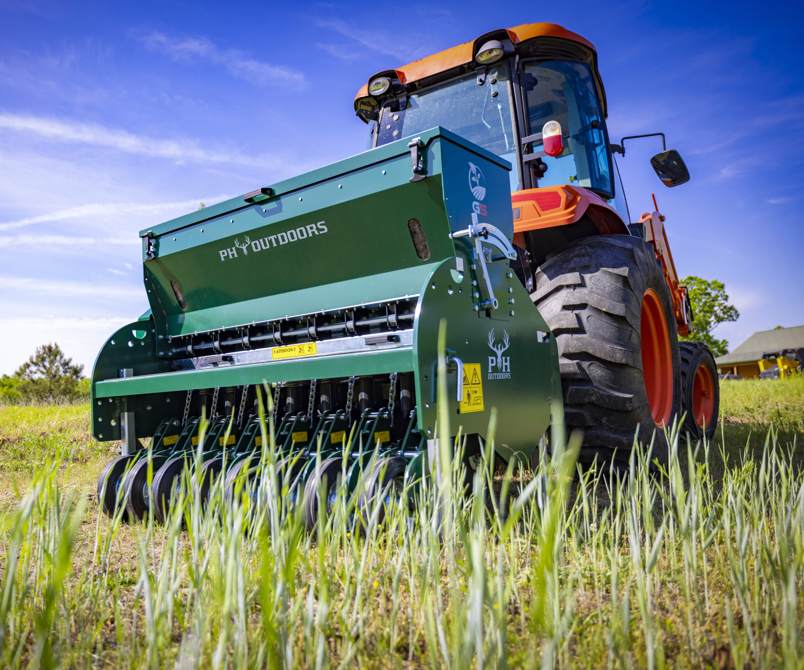 New PH Outdoors Genesis 5 drill with 60" width, 8 rows on 7.5" spacing, 3-point hitch, and an 8-bushel seed box.
