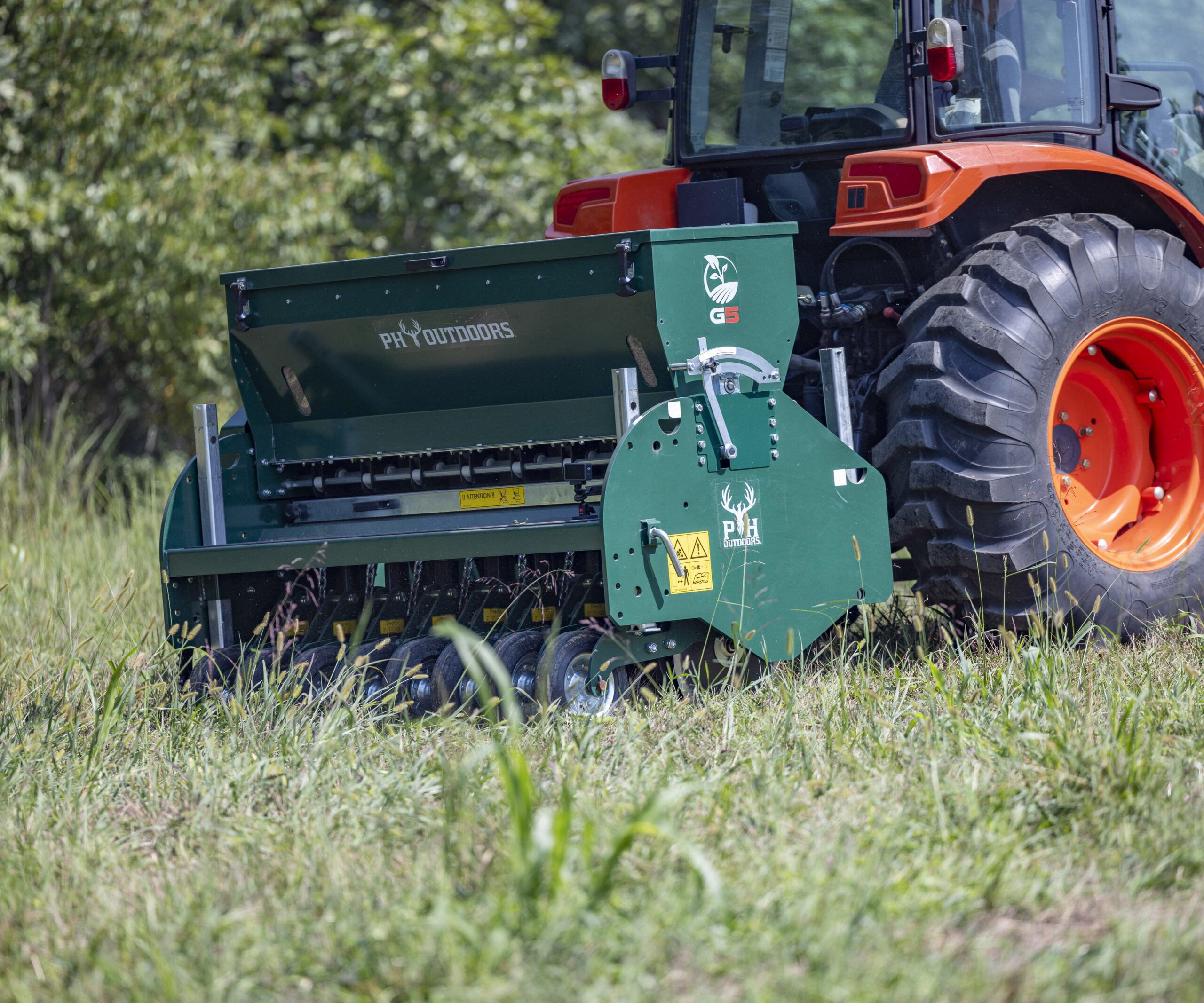 New PH Outdoors Genesis 5 drill with 60" width, 8 rows on 7.5" spacing, 3-point hitch, and an 8-bushel seed box.
