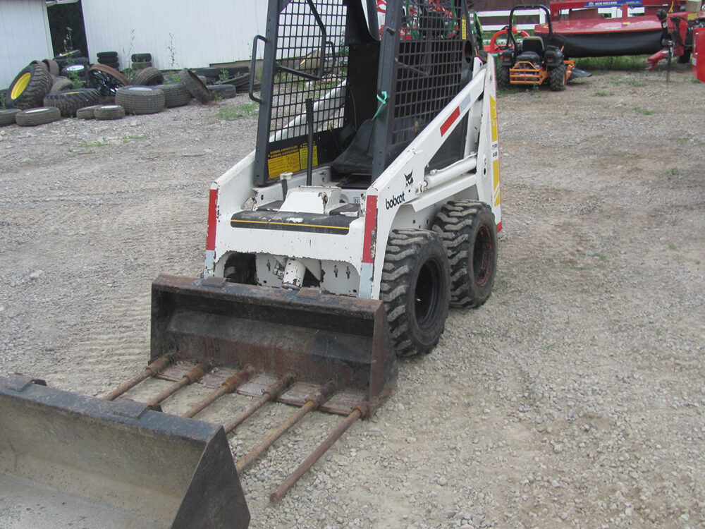 Used 440 Bobcat skid steer with 990 hours; rebuilt main hydraulic control body and bucket cylinder; new bearings and seals in main axle; nice, clean machine