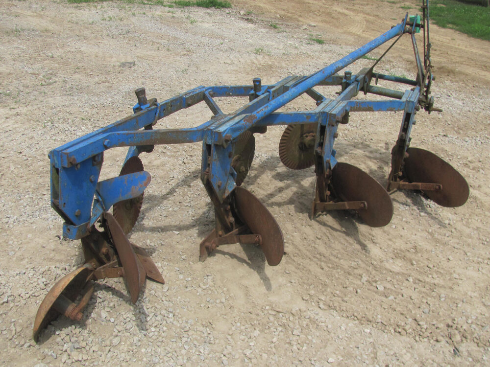 Used 4 moldboard plow in fair condition.