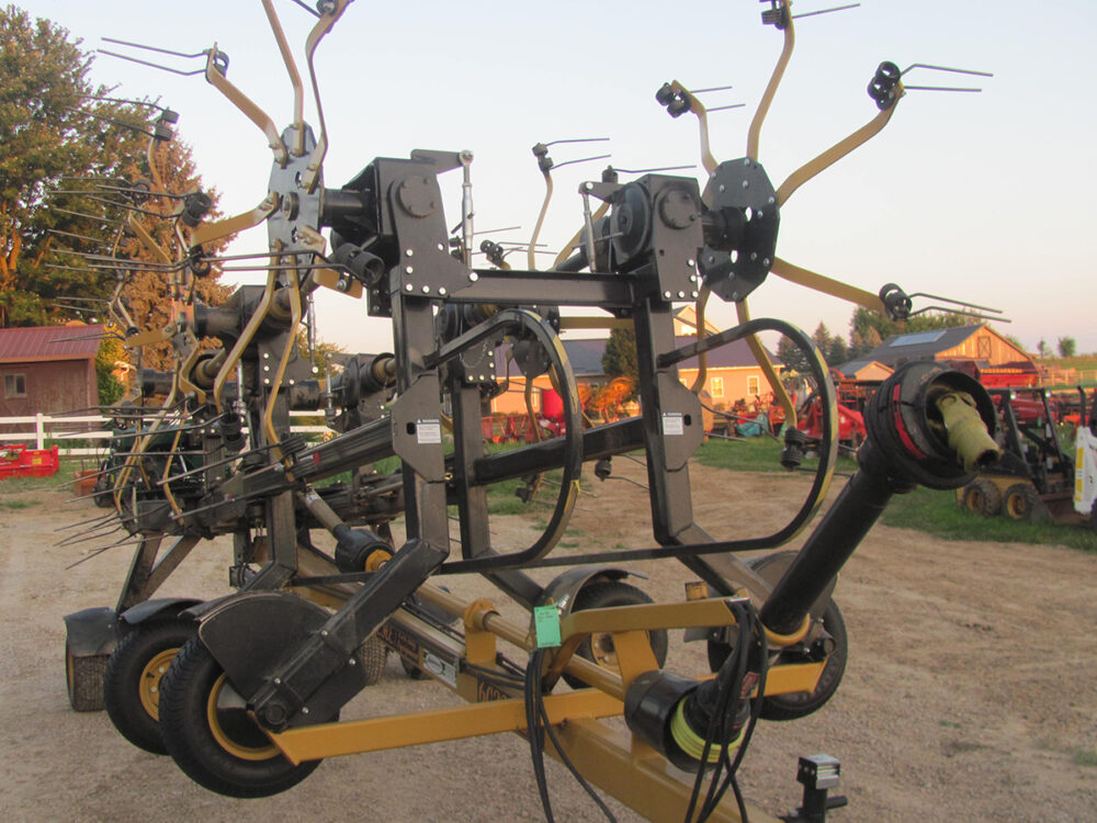 Used 32' Esch 6032 tedder with a hydraulic lift and fold in good condition.