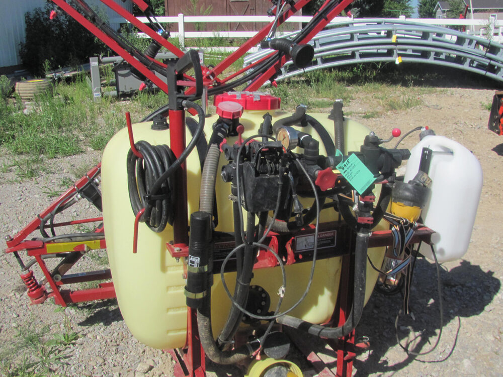 Used Hardi N-105 3-pt sprayer with 105-gallon tank, X-fold booms, foam marker, and PTO drive in good condition.