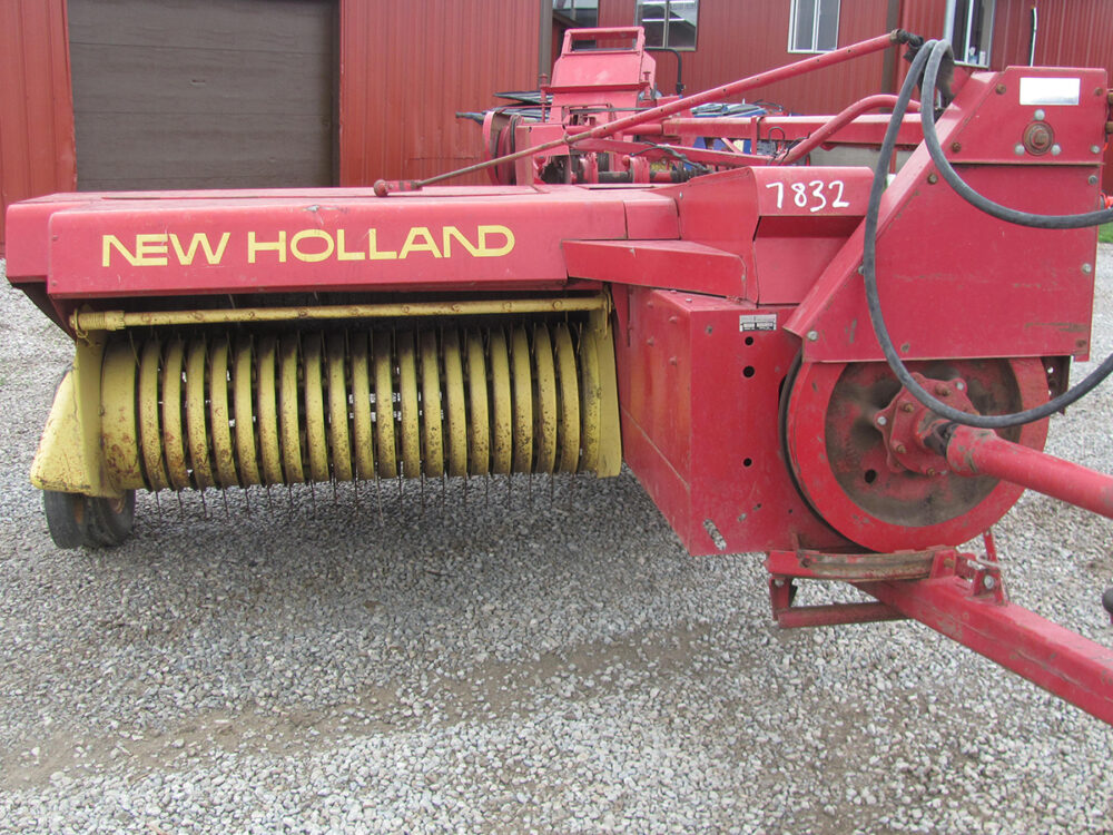 Used New Holland 273 baler with a thrower in good condition.