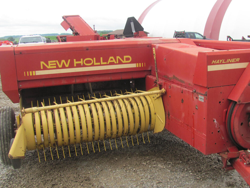 Used New Holland 311 baler with a thrower in good condition.