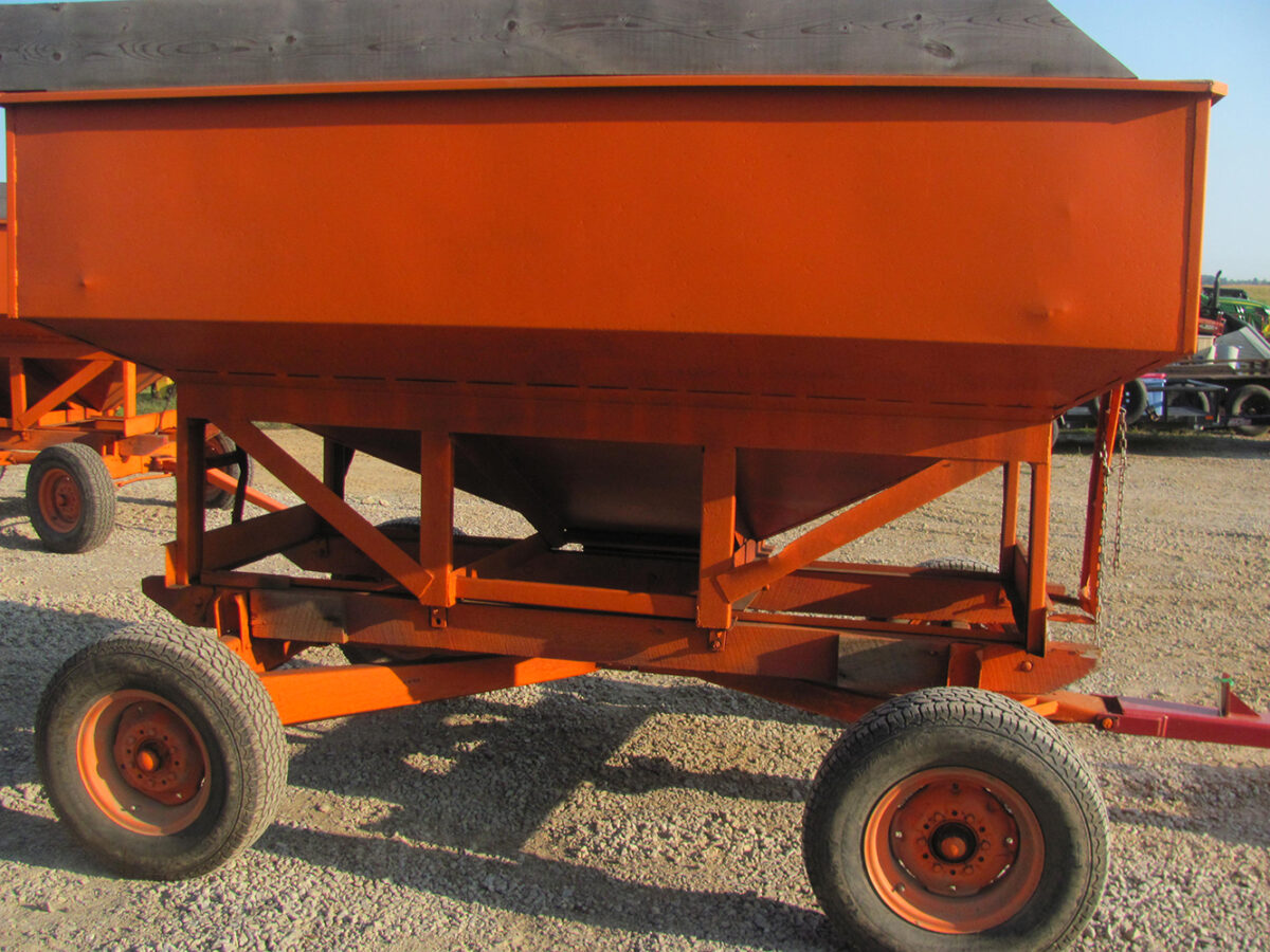 Used gravity wagon, average size with air tires and new quick hitch tongue, unloading door needs a small weld and some rust inside chute opening, otherwise in good condition.