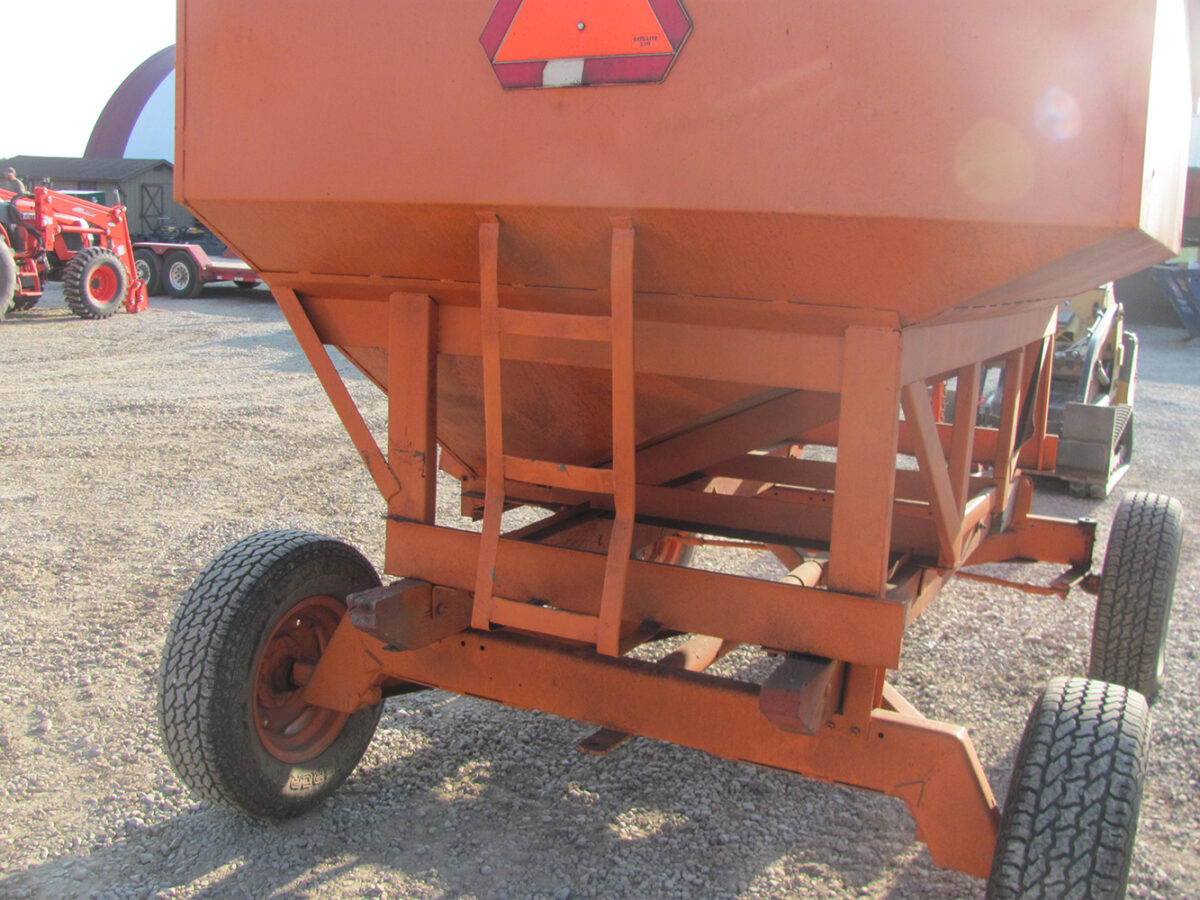 Used gravity wagon, average size with air tires and new quick hitch tongue, unloading door needs a small weld and some rust inside chute opening, otherwise in good condition.