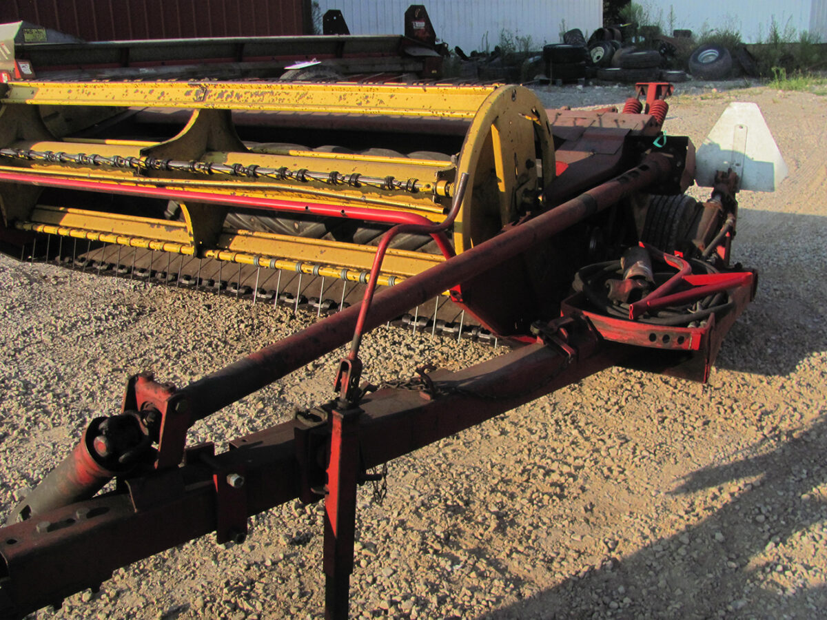 Used New Holland 488 Haybine, 12' wide with good rolls, in good condition.