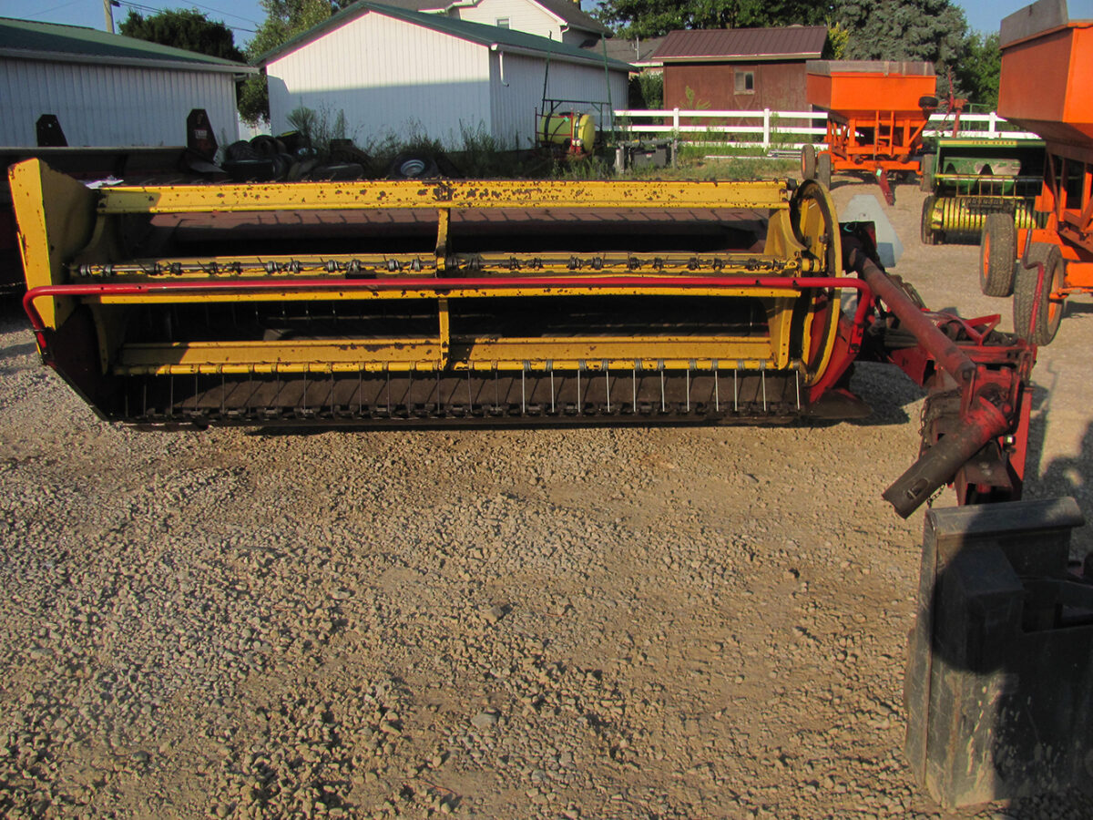 Used New Holland 488 Haybine, 12' wide with good rolls, in good condition.