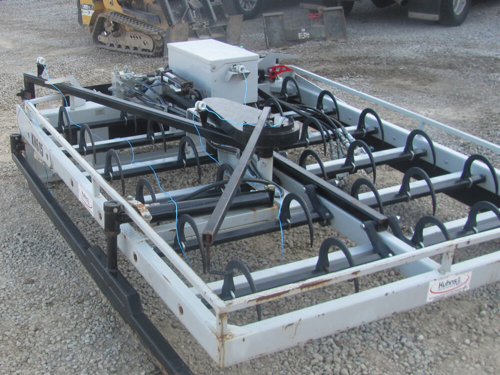 Used KN 615 Tie Grabber in good condition, serial #G154560.