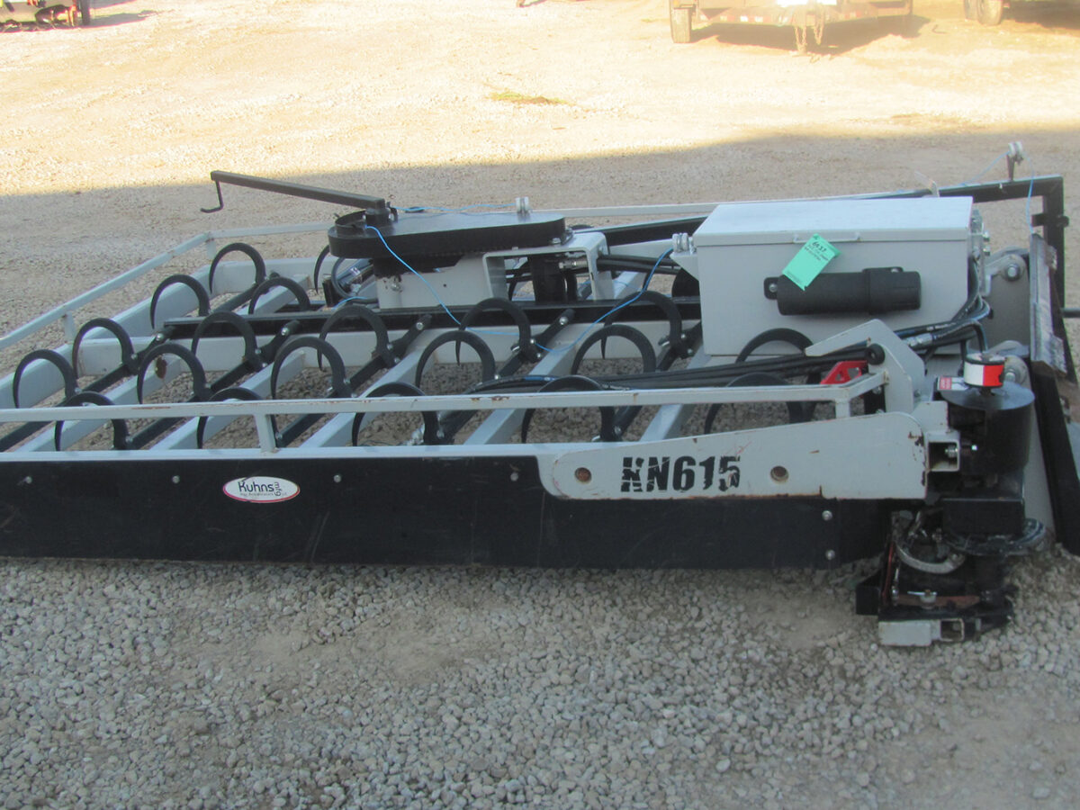 Used KN 615 Tie Grabber in good condition, serial #G154560.