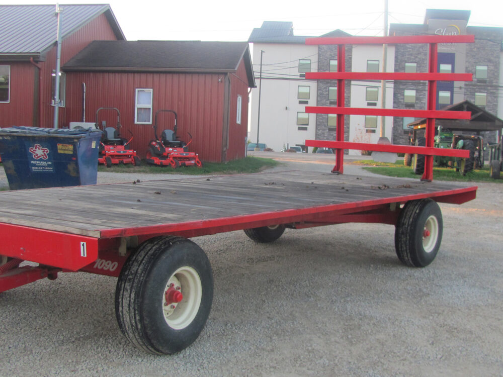 Used EZ Trail flat bed wagon, 8 x 20 with rear upright, in excellent condition, serial #E210549.