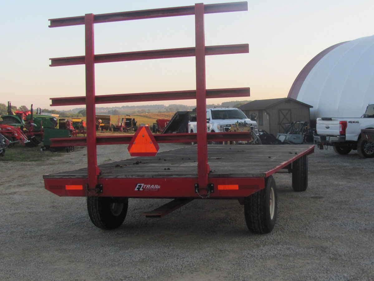 Used EZ Trail flat bed wagon, 8 x 20 with rear upright, in excellent condition, serial #E210549.