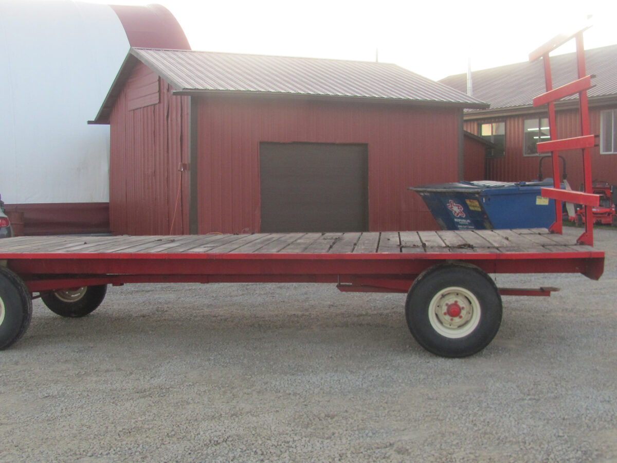 Used EZ Trail flat bed wagon, 8 x 20 with rear upright, in excellent condition, serial #E210549.
