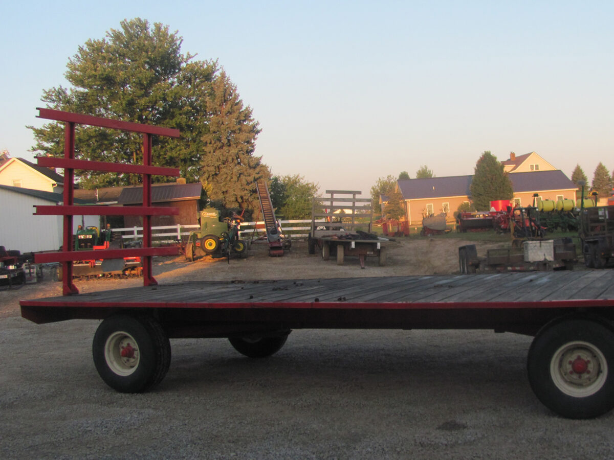 Used EZ Trail flat bed wagon, 8 x 20 with rear upright, in excellent condition, serial #E210549.