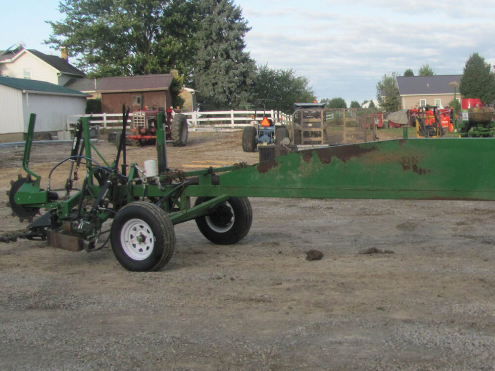 Used FFI 24' mower with 4-horse hitch, approximately 5 years old, in good working condition.