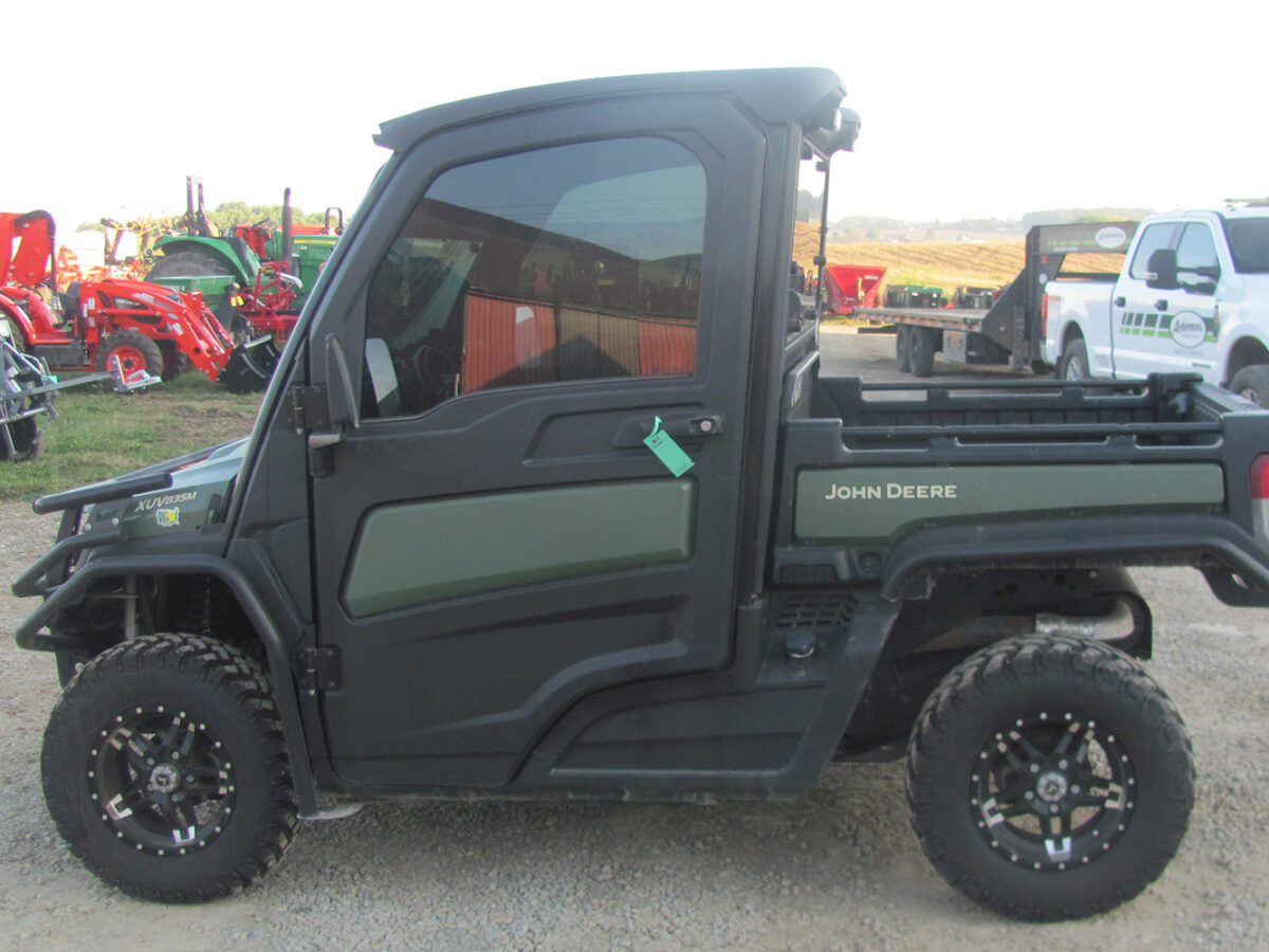 Used 2022 John Deere Gator XUV835M UTV with 4x4, cab, AC/heat, gas engine, radio, winch, power dump bed, 2,496 miles, 496 hours, serial #1M0835MDTN050674 — a nice, clean unit.