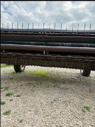 Used MacDon 4000 haybine (serial #133351), with 9' cutting width, steel roll conditioners, in good working condition.