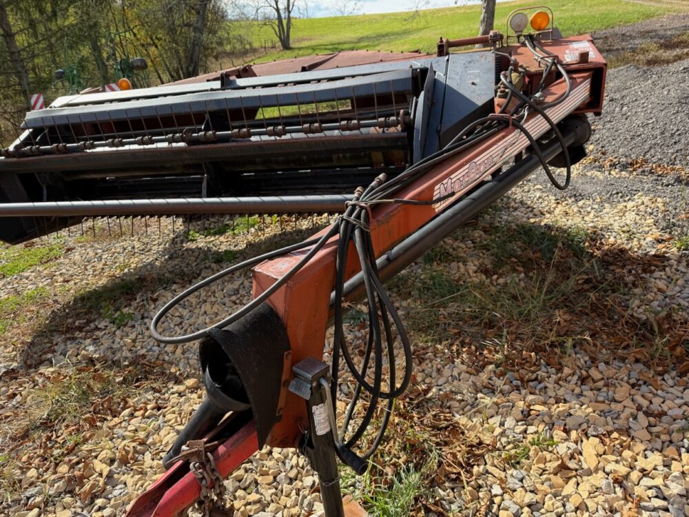 Used Mac Don 4000 Haybine (serial #133351), with 9' cutting width, steel roll conditioners, in good working condition.