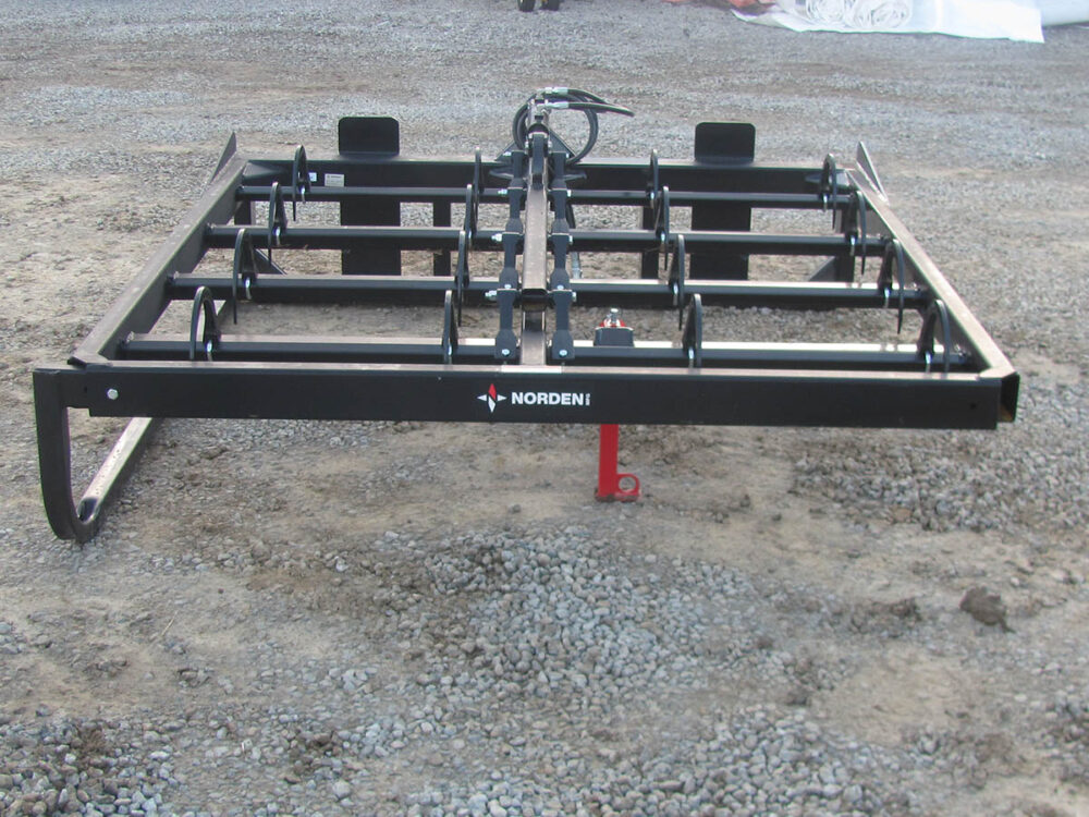 Used Norden 408F 8-bale flat grabber with flat-face hydraulics, requires 1,400-lb lift capacity, fits JD 440R model loader, serial number G297567.