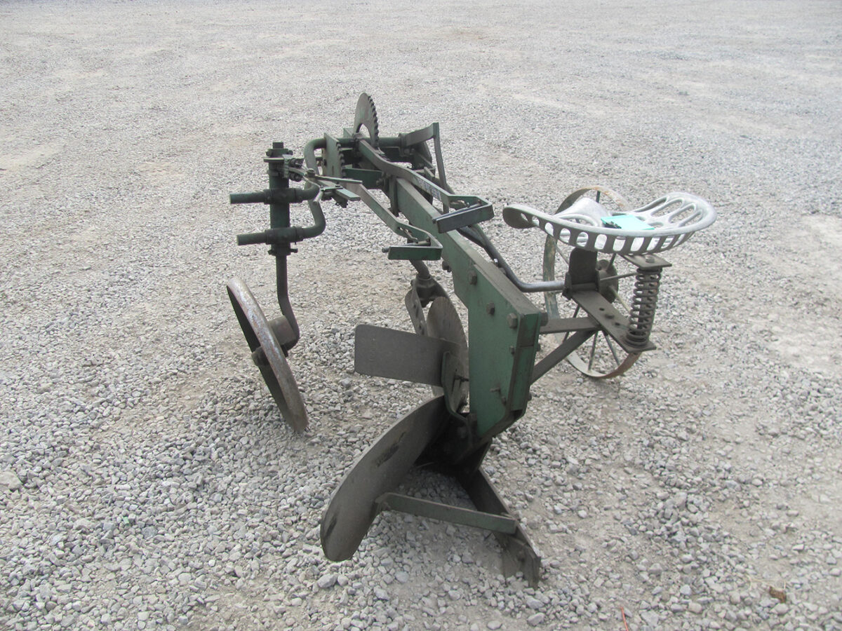 Used Sulky Plow (14" Pioneer Oliver) in good condition.