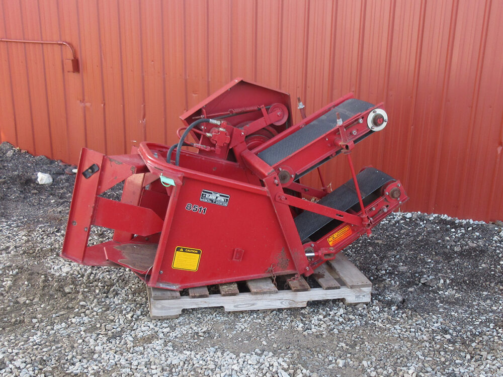 Used bale thrower that fits on a Case IH 8530 baler.