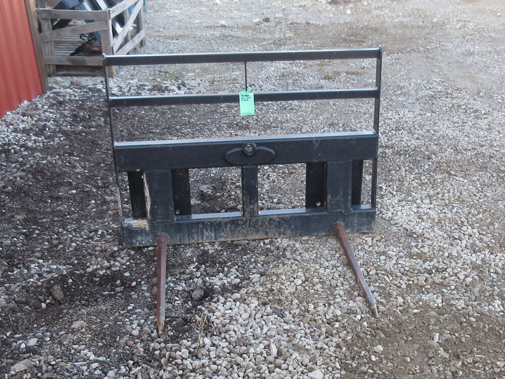 Used 2-prong mast bale spear with 36" spears and in good condition.