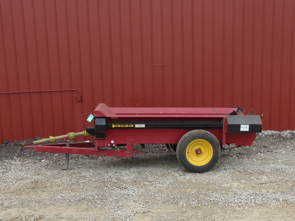 Used Pequea 50P manure spreader with 50-bushel capacity and PTO drive.