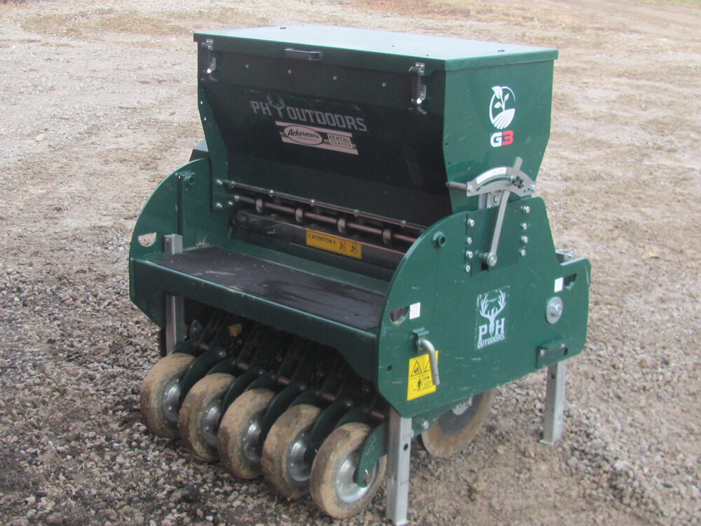 Used PH Outdoors Genesis 3 drill with 36" working width, 3-point hookup, 5–7.5" adjustable planting rows, 4.8-bushel box, and serial #233041.