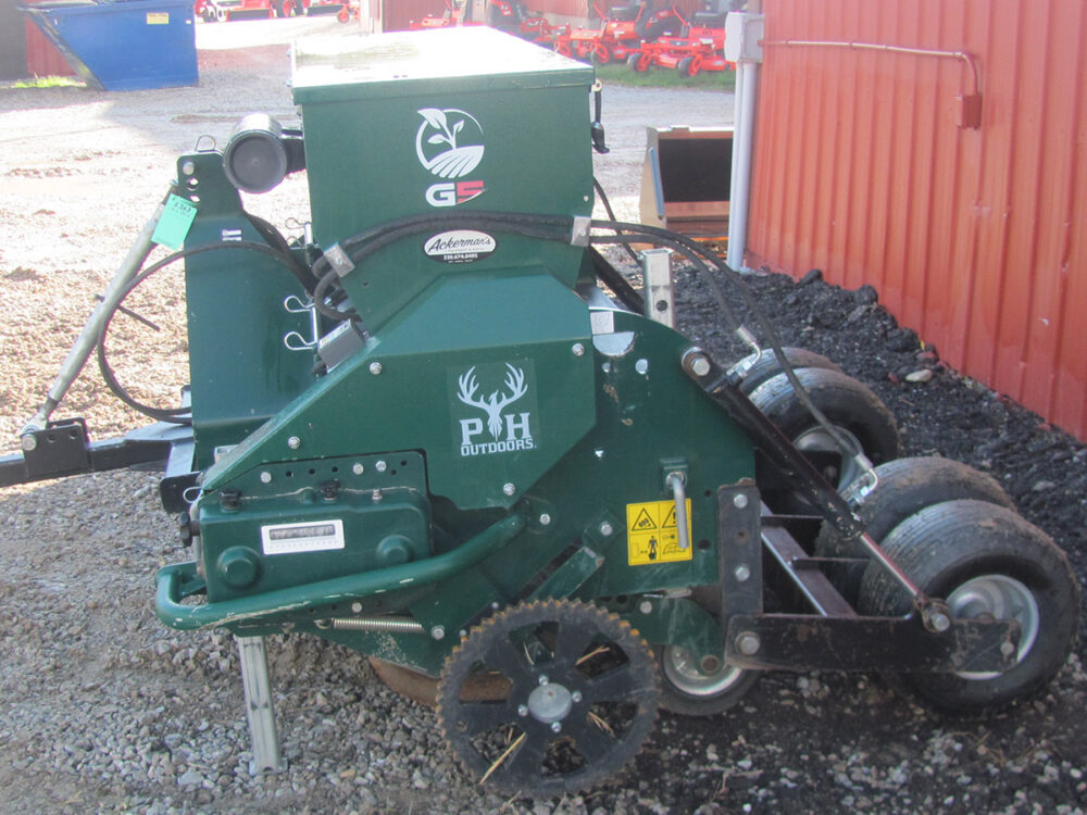 Used PH Outdoors Genesis 5 drill with 60" working width, 8 rows on 7.5" spacing, 8-bushel seed box, serial #235150, and includes wheel kit.