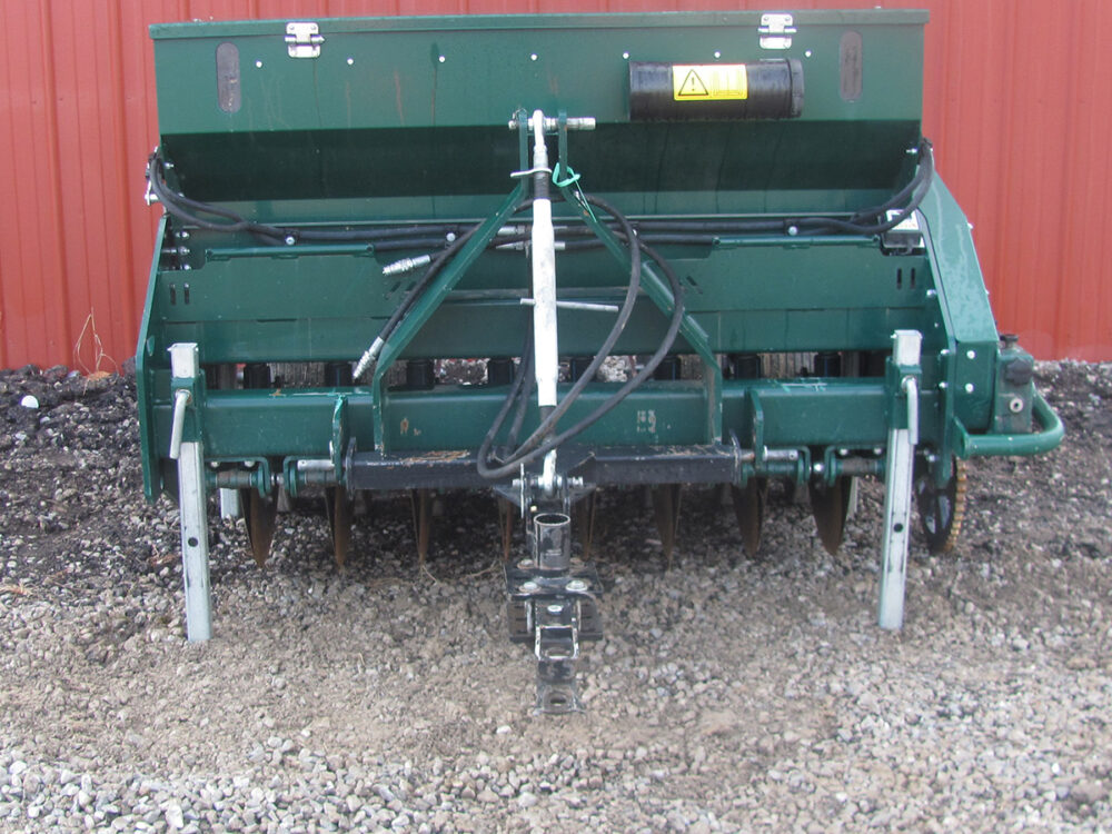 Used PH Outdoors Genesis 5 pull-type drill with 60" working width, 3-point hookup, 8 rows on 7.5" spacing, 8-bushel seed box, and serial #235145.