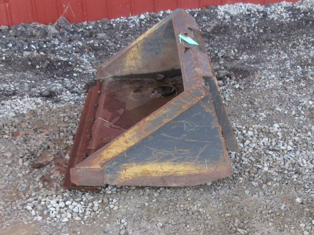 Used 60" skid steer bucket in fair condition.