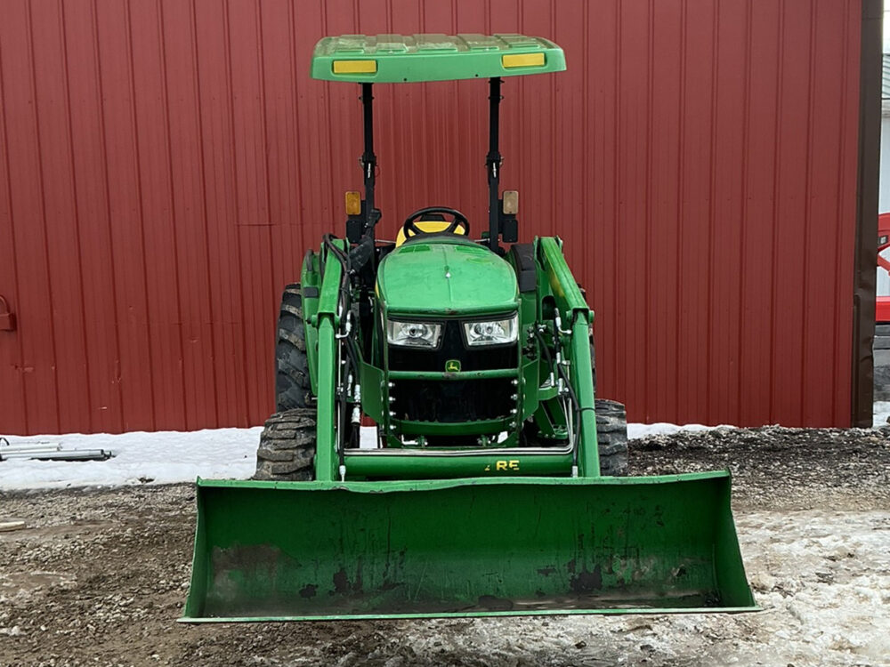 Used John Deere 4044M tractor with loader and canopy, hydrostatic transmission, 3rd function kit, two rear remotes, 440 hours, 2023 model year, serial #1LV4044MHPN121485, and in excellent condition.
