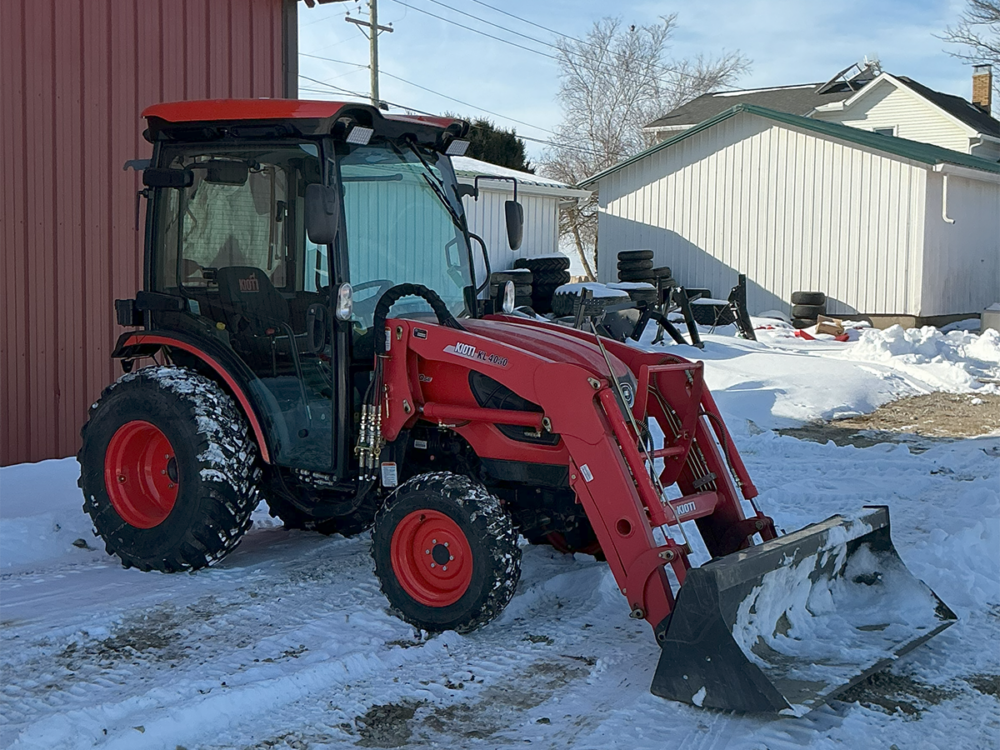 Used Kioti CK2610SE Hydro tractor with cab, 24.5 HP, loader, 295 hours, approximately a 2021 model, and serial #WA0G00481.