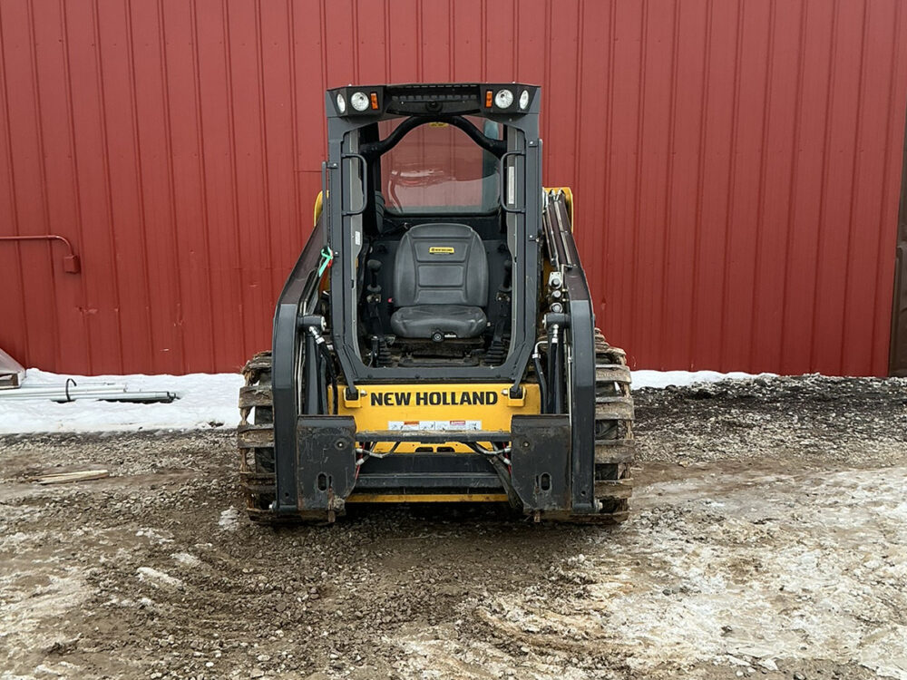 Used New Holland L316 skid steer with 199 hours, steel tracks, serial #NMM494359, and in excellent condition.