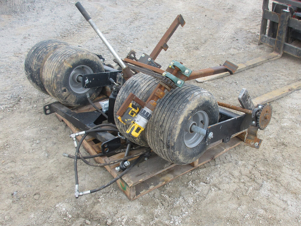 Used 5' drill wheel kit with mechanical lift (cordless drill setup) and foam-filled wheels.