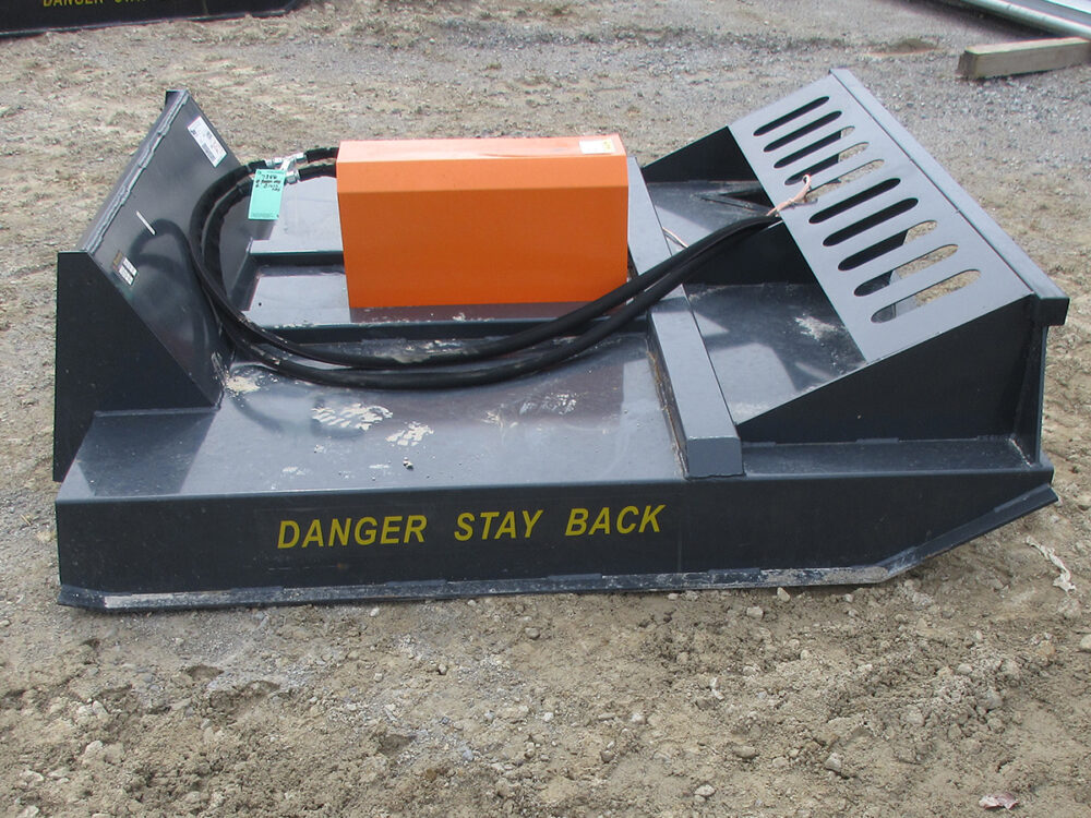 Used Wolverine BC-13-72W brush hog with 6' cutting width, skid loader mount, and serial #2W-04611.