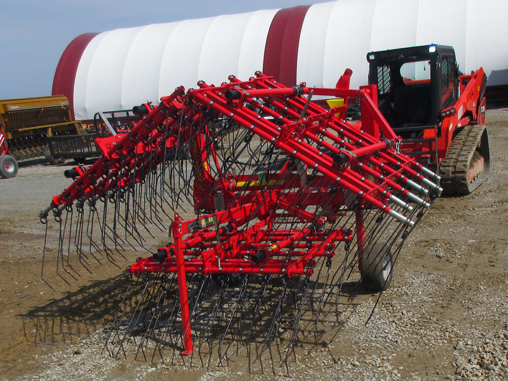 Used Einbock 15' tine weeder with 3-section frame, 3-point hookup, excellent condition, and serial #1900850944.