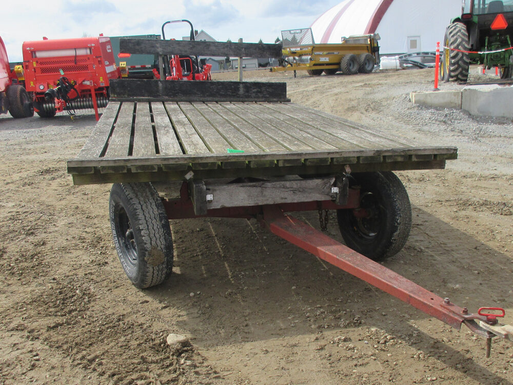 Used hay wagon with uprights and good running gear.