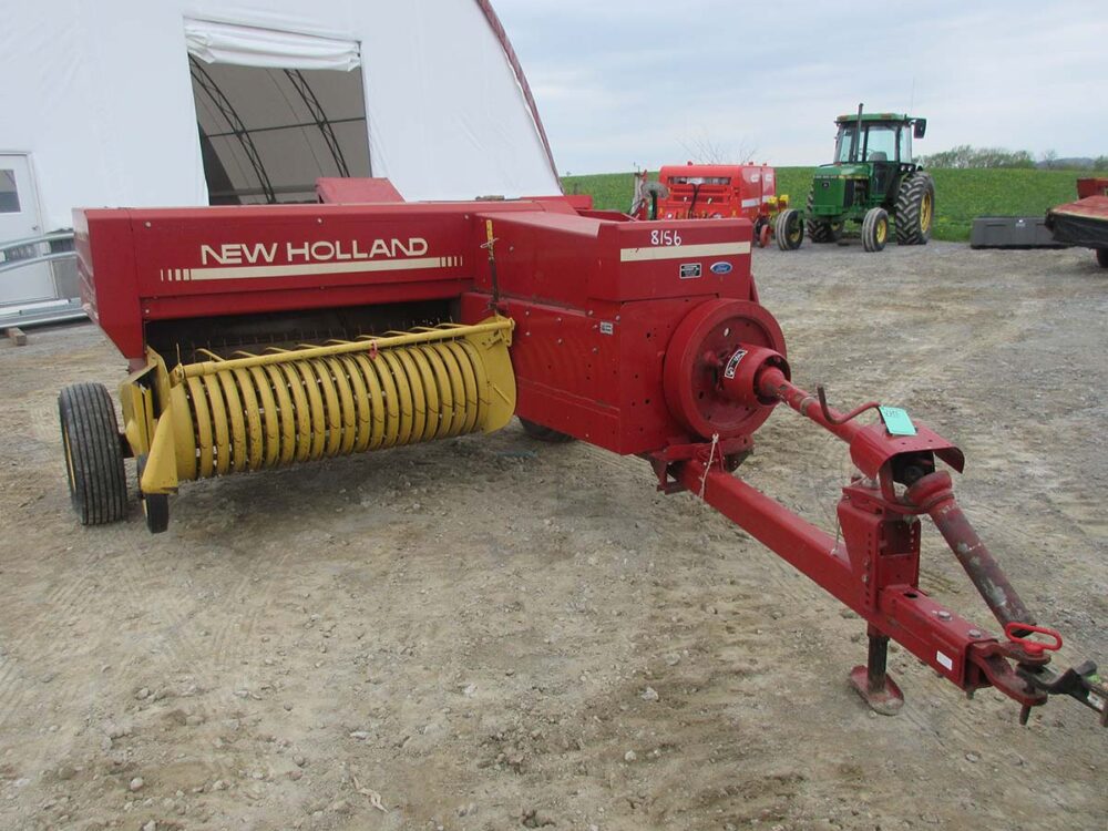 Used New Holland 311 Baler, super sweep, mechanical tension, chute, fair condition, SN 794623.