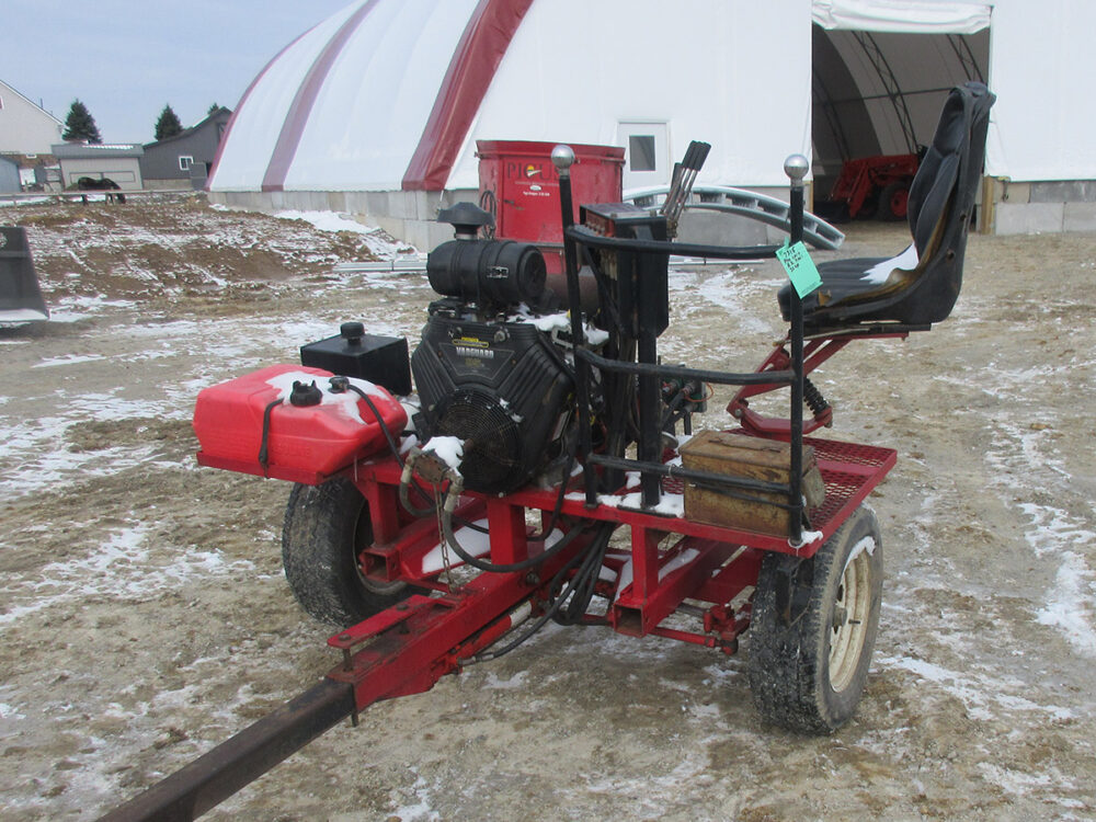 Used EZ Trail PTO cart with 35 HP Vanguard engine, hydro steering, Taylor clutch, and in good condition.