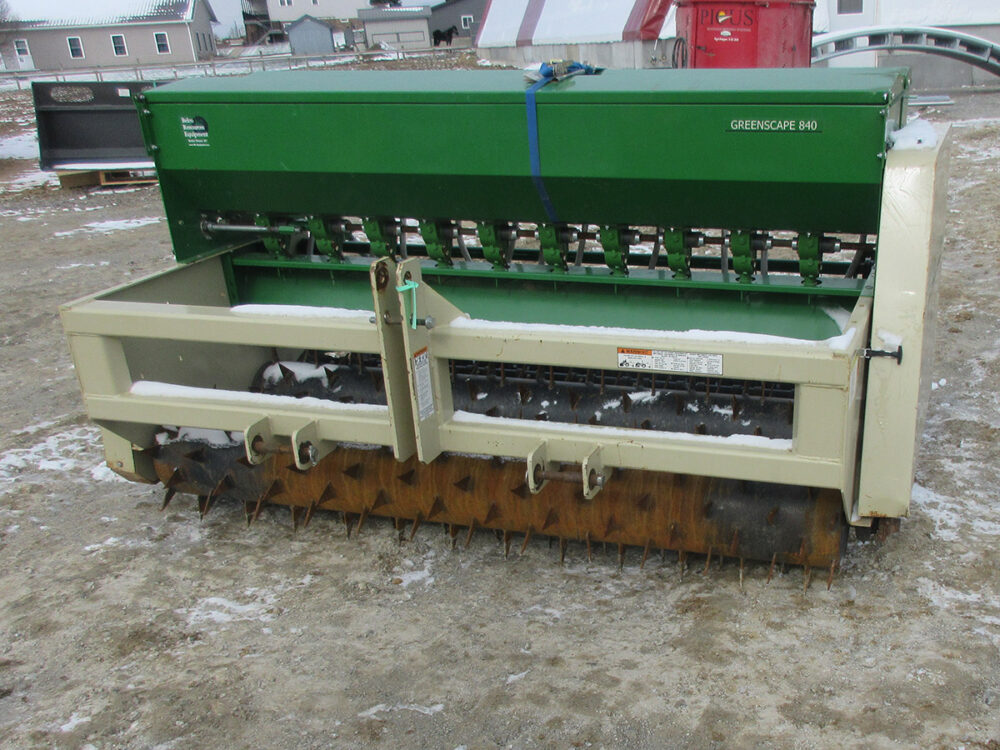 Used Strickland 840-2NR conservation seeder with 7' working width, 3-point hookup, and rear packer.