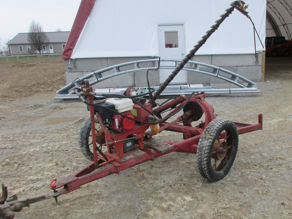 Used New Holland 455 sickle bar mower with 7' cutting width, engine mount, steel with rubber wheels, good working condition, and serial #4468.