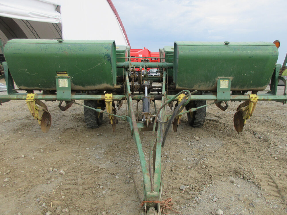 Used John Deere grain drill approximately 10' working width and needs some TLC.