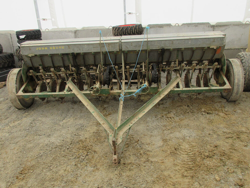 Used John Deere 10' grain drill and serial #001828-N.