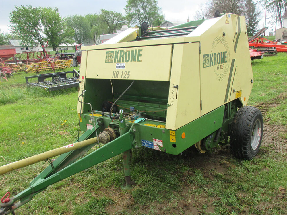 Used round baler, Krone 125 4x4, fair condition, twine tie, rear end is bent in some, used as main baler on farm in 2024, SN 363162