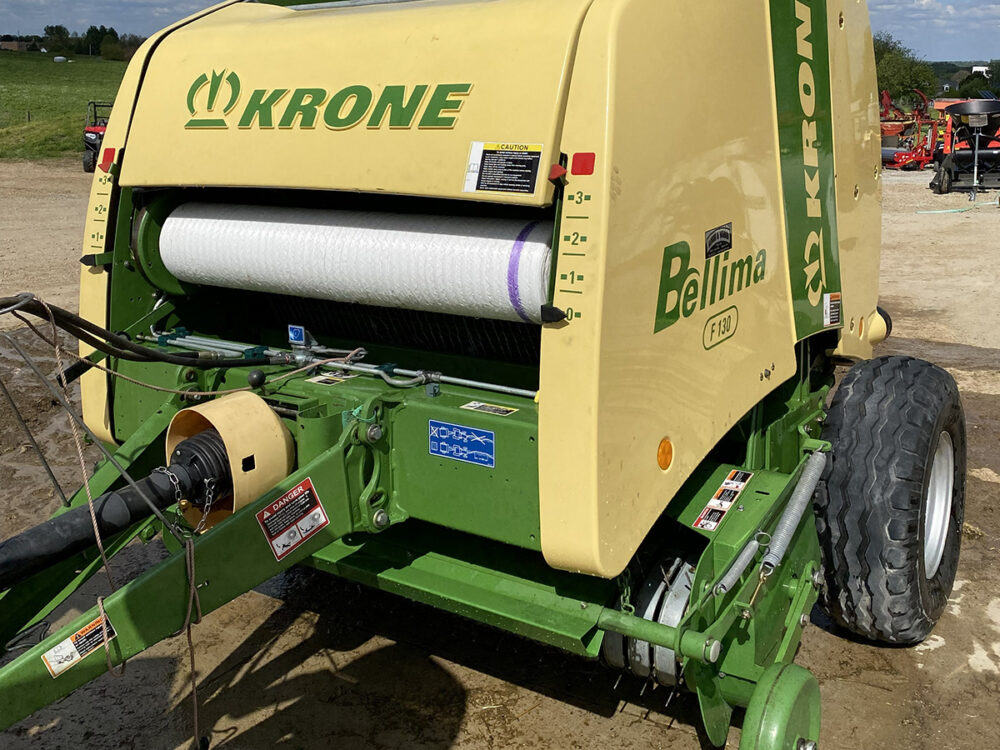 Used round baler, Krone, netwrap, wide pickup, stored inside, SN 340952.