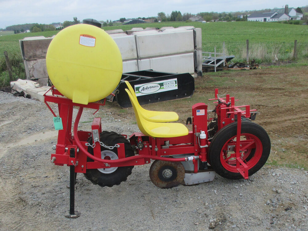Used mechanical transplanter, 1000B-3, OPCA 12-3-482, 3 pocket chain with water and 482 finger extensions, 2 fiberglass seats, 2 plant boxes and stands, round point shoe, upgraded double disc opener poly shoe, steel packing wheels and toolbar clamps, upgraded rubber packing wheels, water valve, 60 gallon poly barrel, single row 3-point hitch, new in 2020, used twice, stored inside barn.