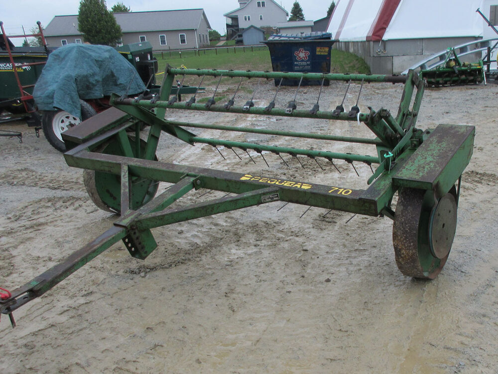 Used Pequea 710 fluffer tedder with serial #0319.